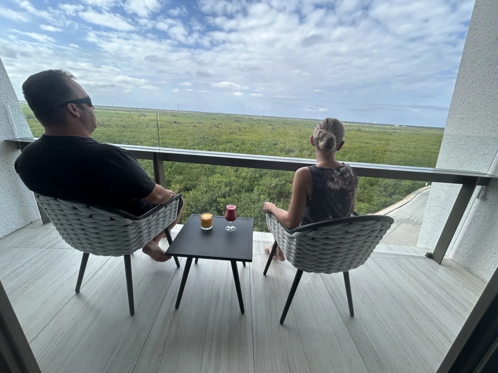 Relaxing on my gardenview balcony overlooking the mangroves at Hilton Cancun